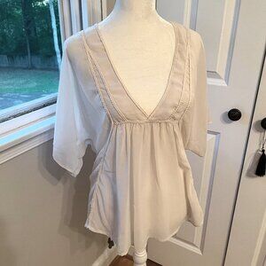 Sheer, off white top